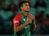 Bangladesh's Taskin Ahmed reacts after taking the wicket of Oman's Zeeshan Maqsood during the qualifying match for the World T20 cricket tournament between Bangladesh and Oman at The Himachal Pradesh Cricket Association Stadium in Dharamsala on March 13, 2016. / AFP / STR (Photo credit should read STR/AFP/Getty Images)