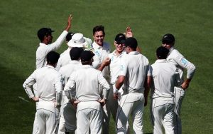Trent Boult of New Zealand celebrates with teammates. (Photo by Anthony Au-Yeung/Getty Images)