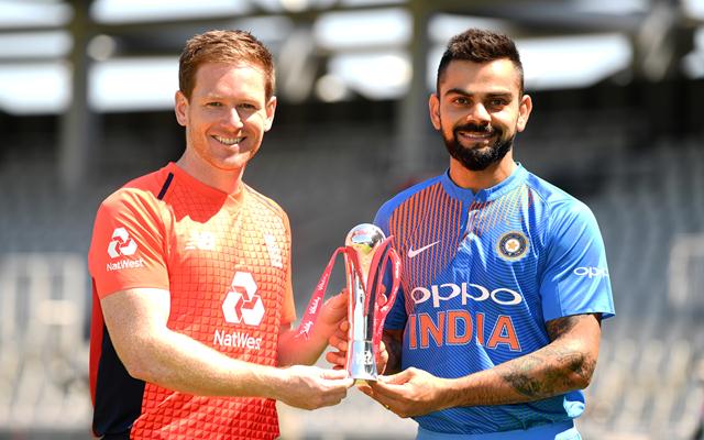 England captain Eoin Morgan and India captain Virat Kohli hold the series trophy. (Photo by Gareth Copley/Getty Images)