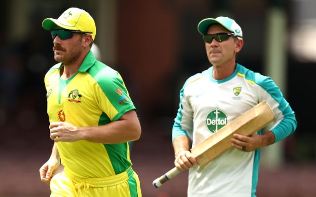 Aaron Finch and Justin Langer. (Photo by Ryan Pierse/Getty Images)