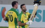 Andrew Tye and Ashton Turner. (Photo by MUNIR UZ ZAMAN/AFP via Getty Images)