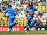 Sachin Tendulkar and Virender Sehwag (Photo credit should read PRAKASH SINGH/AFP/Getty Images)
