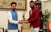 Anurag Thakur and Cheteshwar Pujara (Image Source: Twitter)