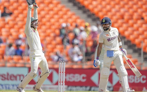 Alex Carey and Virat Kohli. (Image Source: Getty Images)