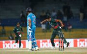 Tanzim Hasan Sakib & Rohit Sharma (Photo by Pankaj Nangia/Getty Images)
